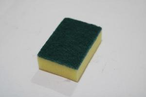 photo of yellow and green soap for cleaning dishes