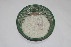 photo of white rice in a green container