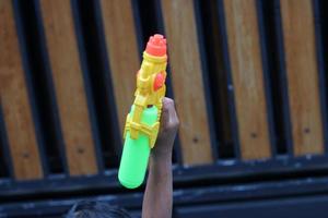 photo of toy gun being carried