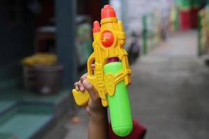 photo of toy gun being carried