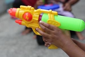 photo of toy gun being carried