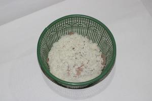 photo of white rice in a green container