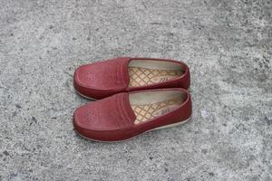 photo of women's shoes dark red