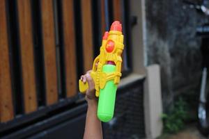 photo of toy gun being carried