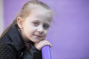 Blond-haired girl of elementary age portrait. photo