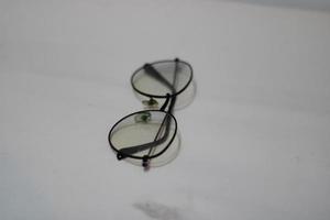 Photo of modern glasses with white background