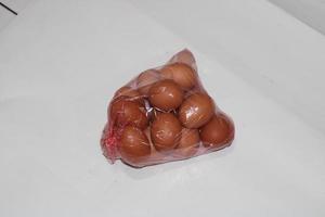 photo of eggs in transparent plastic wrap