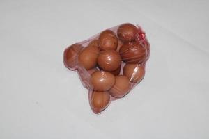 photo of eggs in transparent plastic wrap