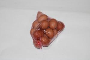 photo of eggs in transparent plastic wrap