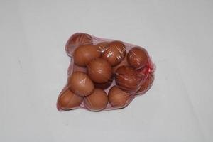 photo of eggs in transparent plastic wrap