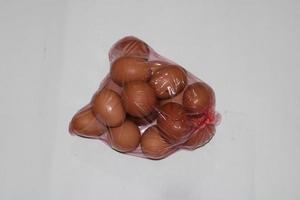 photo of eggs in transparent plastic wrap