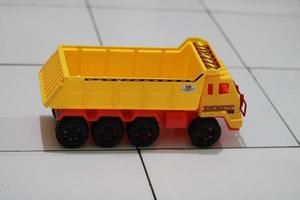 Photo of a yellow children's toy truck