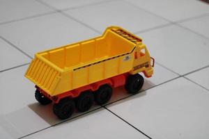 Photo of a yellow children's toy truck