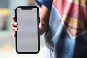 Photo of an empty cell phone held in hand