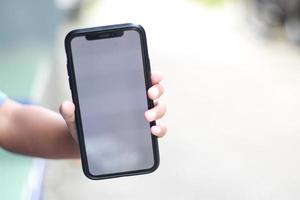 Photo of an empty cell phone held in hand