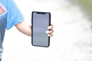 Photo of an empty cell phone held in hand