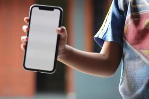 Photo of an empty cell phone held in hand
