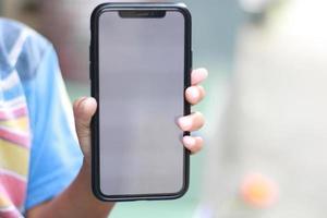 Photo of an empty cell phone held in hand
