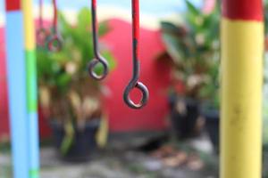 photo of an old iron hanger in a children's playground