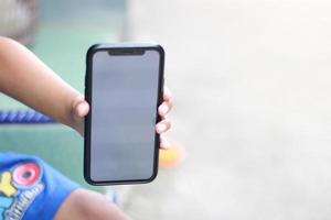 Photo of an empty cell phone held in hand
