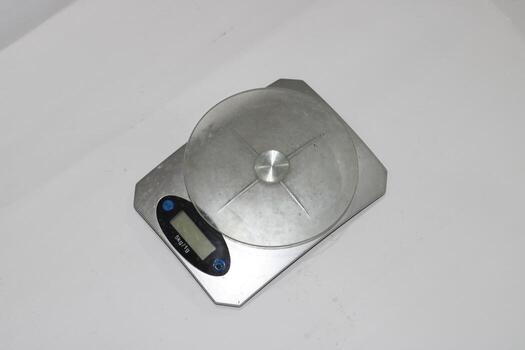 Photo of a digital scale with a white background