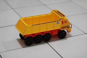 Photo of a yellow children's toy truck