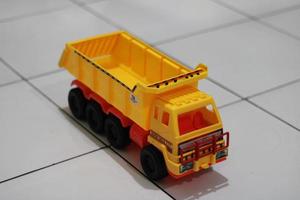 Photo of a yellow children's toy truck