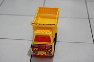 Photo of a yellow children's toy truck