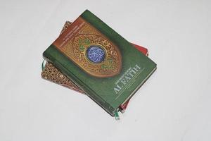 photo of quran with white background