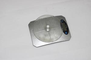 Photo of a digital scale with a white background