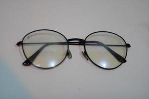 Photo of modern glasses with white background