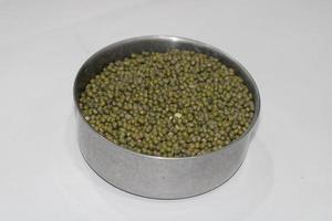 Photo Of Green Nuts On An Iron Container