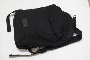 Photo of a black bag on a white background