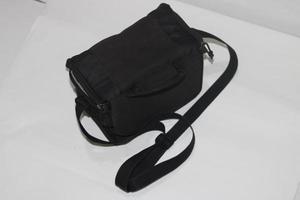 Photo of a black bag on a white background