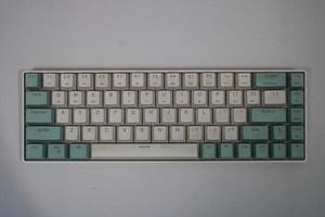 photo of a white and light blue computer keyboard