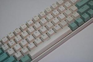 photo of a white and light blue computer keyboard