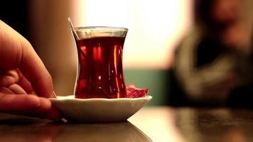 Drinking turkish tea in a cafe video