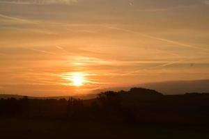 Low Sun in Orange Sky photo