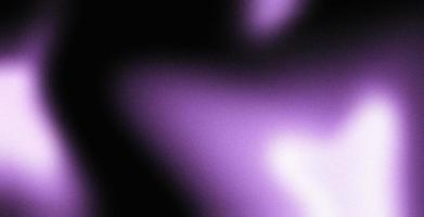 Abstract purple lights on dark grainy background, glowing light spots on black photo