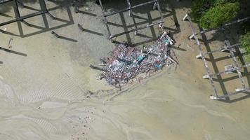 Aerial top down view rubbish garbage at the beach video