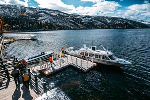 Yachts on the lake in the mountainous photo