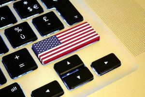 American flag on computer key photo