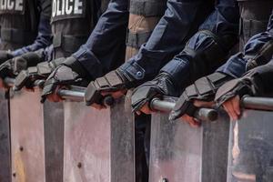 Riot police control the crowd. photo