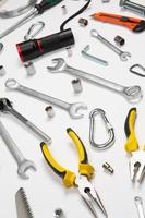 Set of tools for repair in a case on a white background. Assorted work or construction tools. Wrenches, Pliers, screwdriver. Top view photo