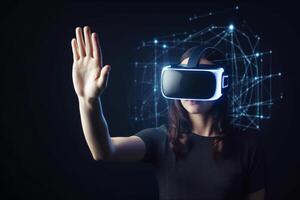 a woman wearing a virtual reality headset touching the virtual object on dark background. photo