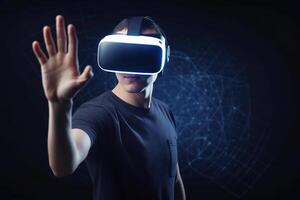 a man wearing a virtual reality headset touching the virtual object on blue tech background. photo