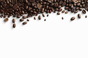 Roasted coffee beans on white background with copy space. photo