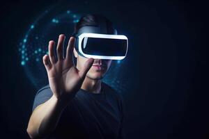 a man wearing a virtual reality headset touching the virtual object on blue tech background. photo