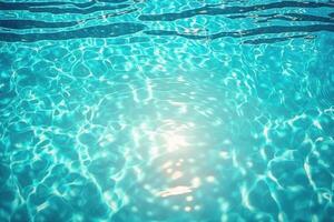 Pool water surface background with sunlight reflection. photo