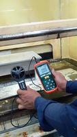 Jakarta Indonesia April 2023 A worker is taking measurements of airflow velocity in a chemical room in a laboratory. photo